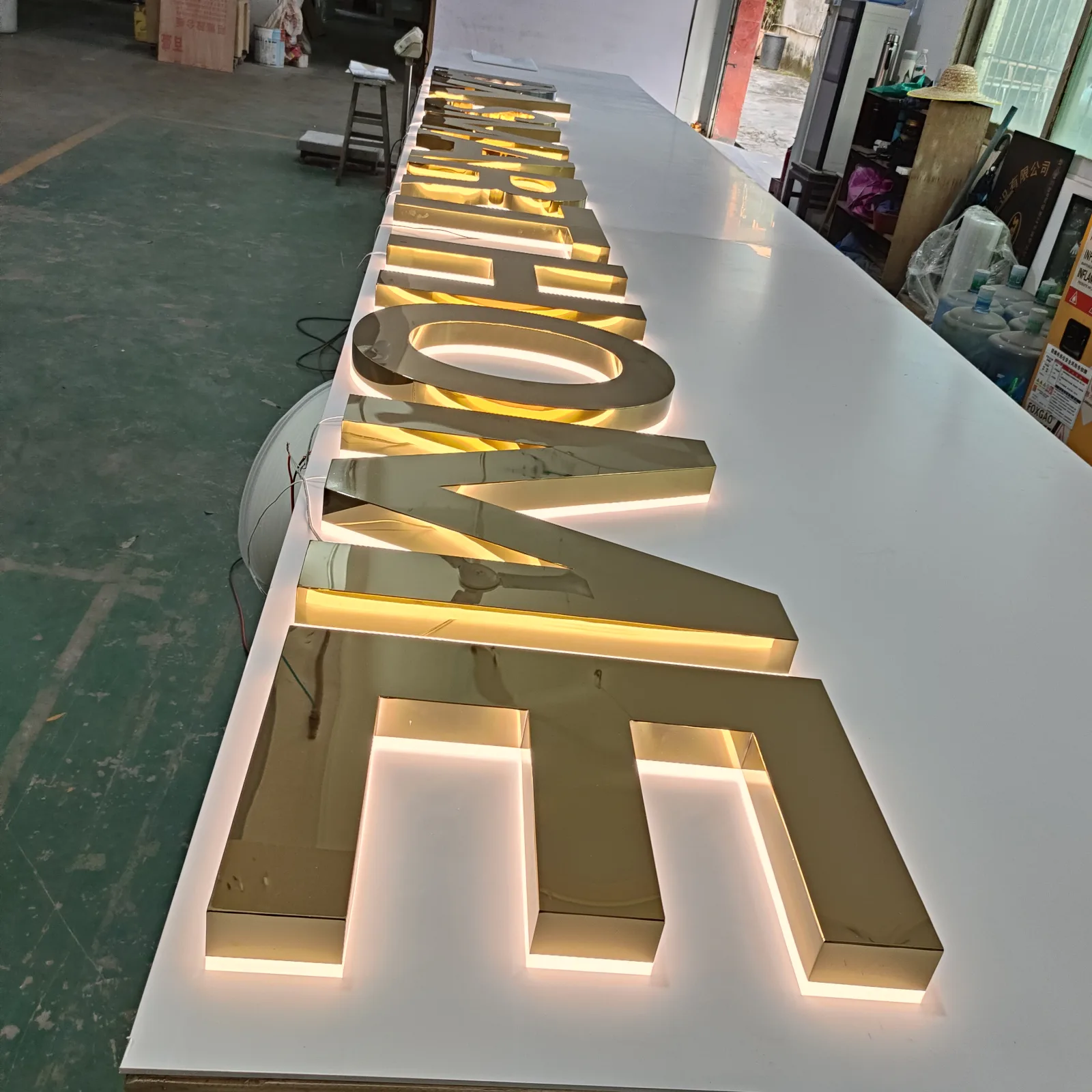Mirror gold stainless steel backlit letters for DA Smart Home in the UK